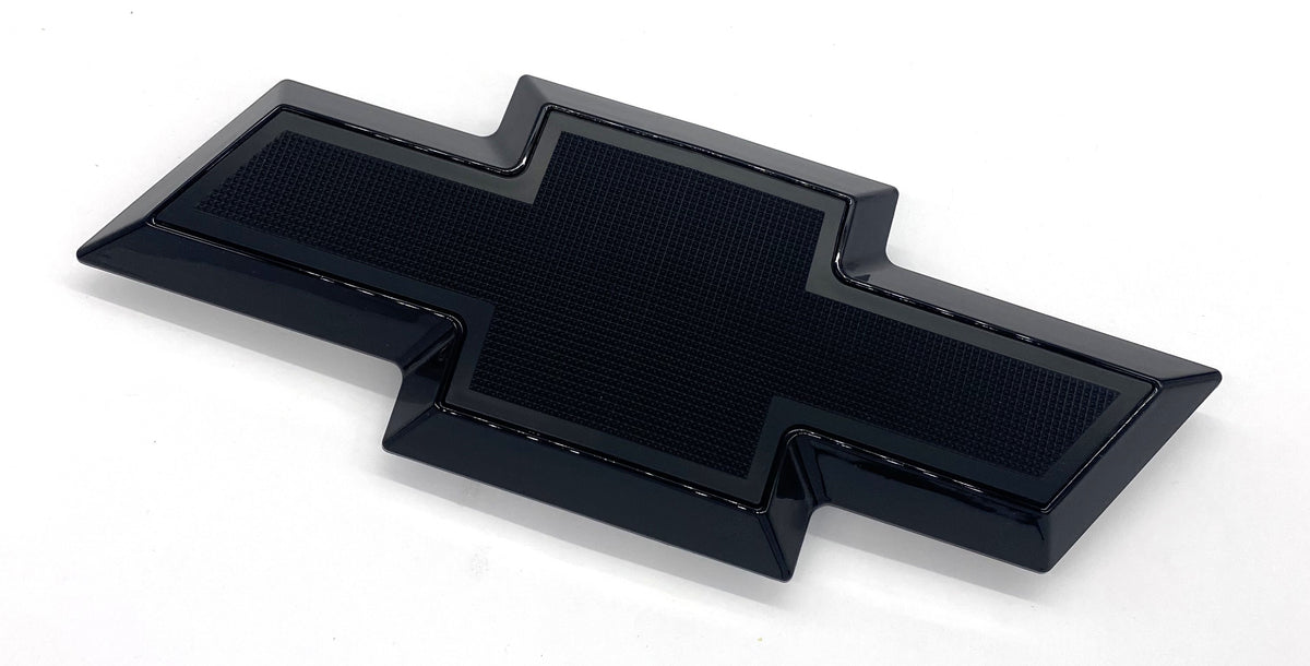 Front grille bowtie emblem for Chevy Silverado HD 2011-2014, black with black center, angled view